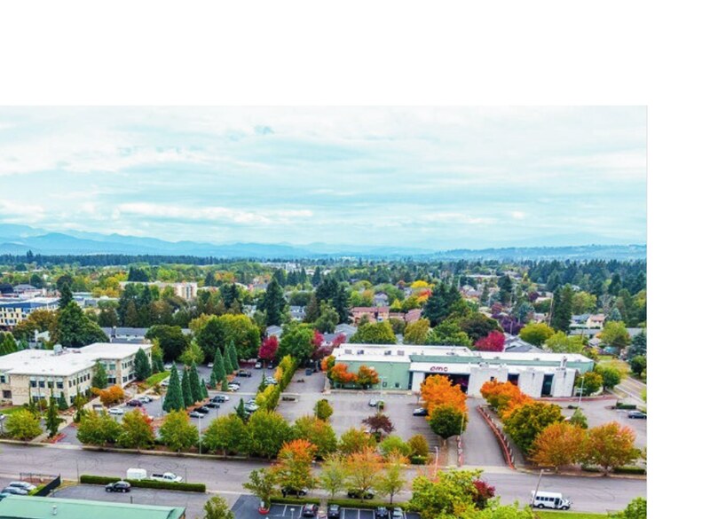 Wide aerial view of the surrounding neighborhood